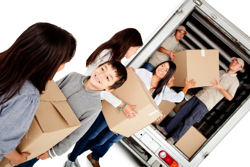 Removal team assisting with a Canary Wharf apartment move
