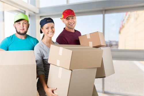 Office relocation support in Canary Wharf with desks and equipment being moved