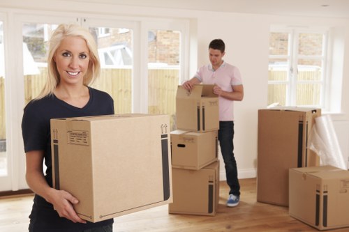 House movers helping a Canary Wharf apartment relocation with careful packing