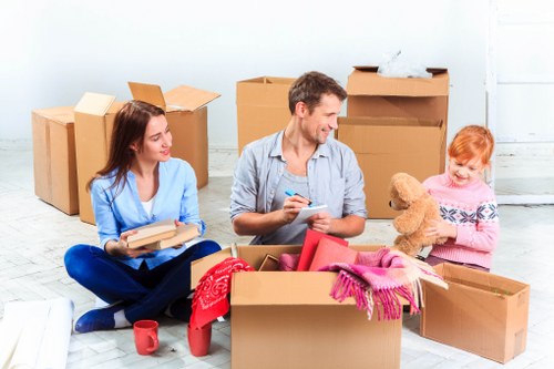 Packed moving boxes ready for a Canary Wharf home or office relocation