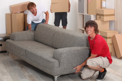 Moving boxes and household items from a high-rise building in Canary Wharf