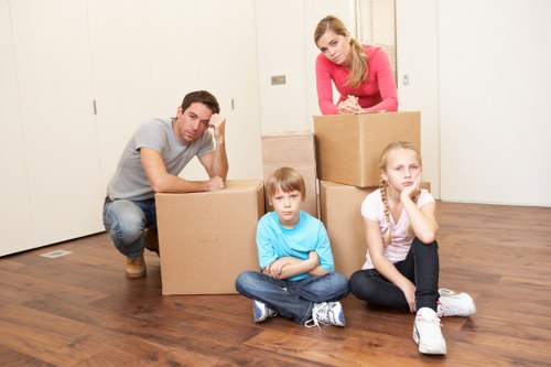 Preparing boxes and furniture for a Canary Wharf moving van service