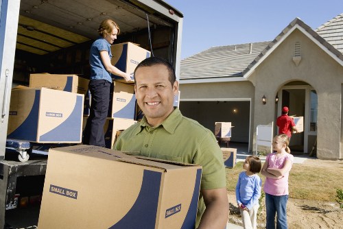 Team member reviewing emergency safety procedures during a removal job