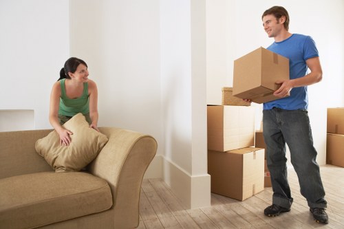 Packed boxes and furniture prepared for a local Canary Wharf relocation